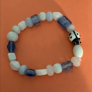 white/blue ladybug bracelet